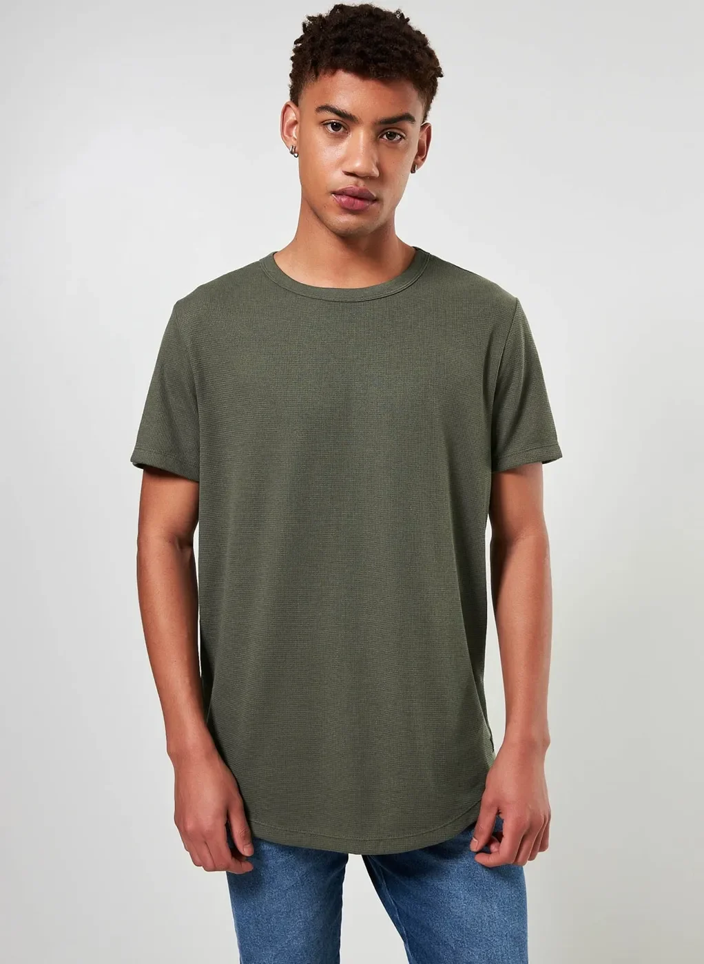 Camiseta Alongada em Malha Texturizada