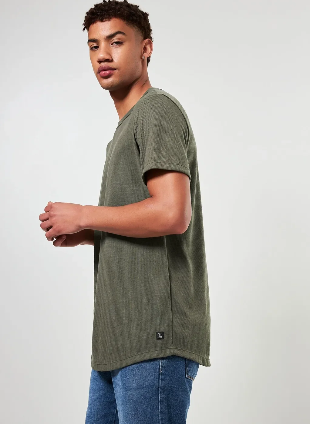 Camiseta Alongada em Malha Texturizada