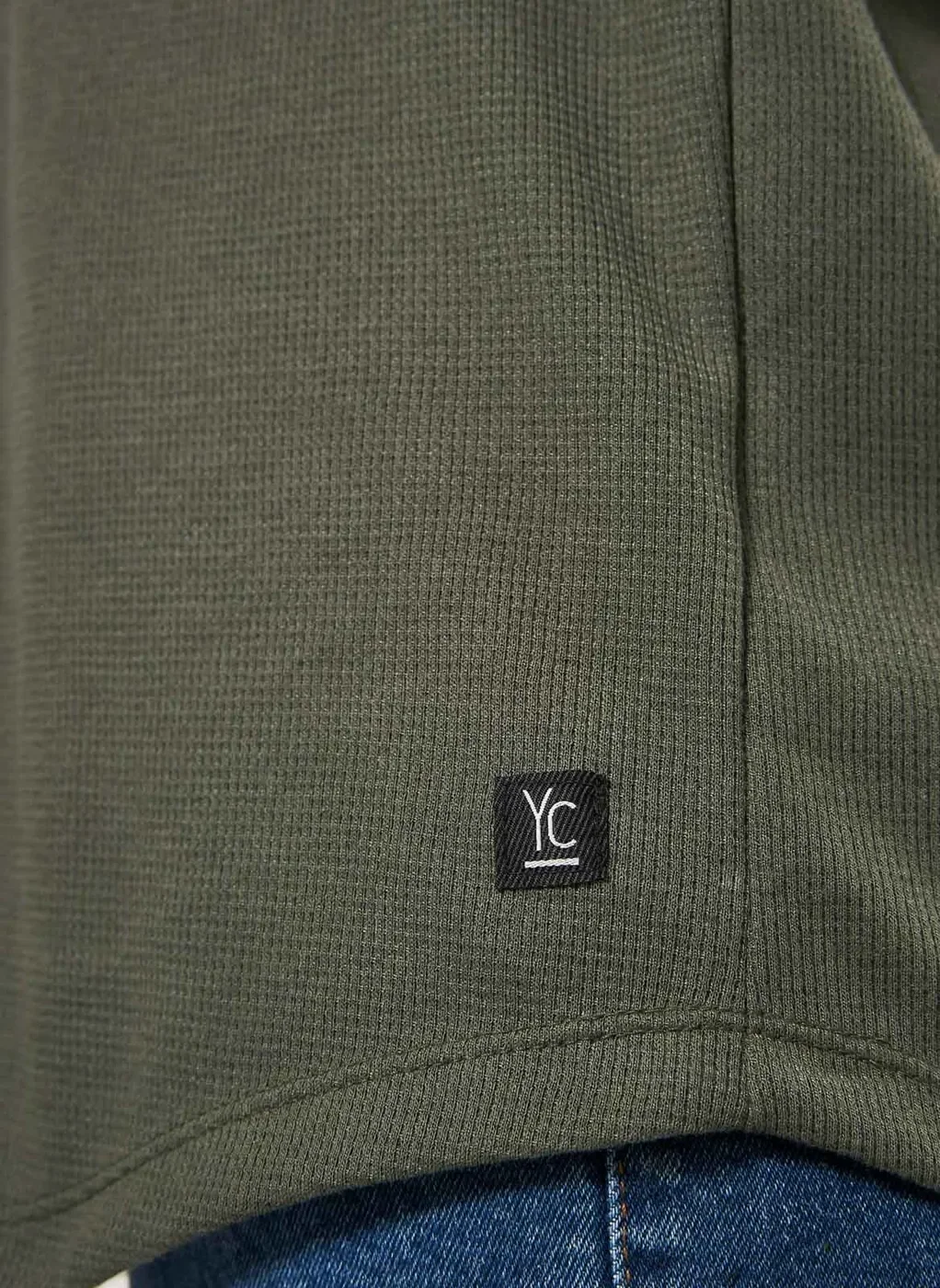 Camiseta Alongada em Malha Texturizada