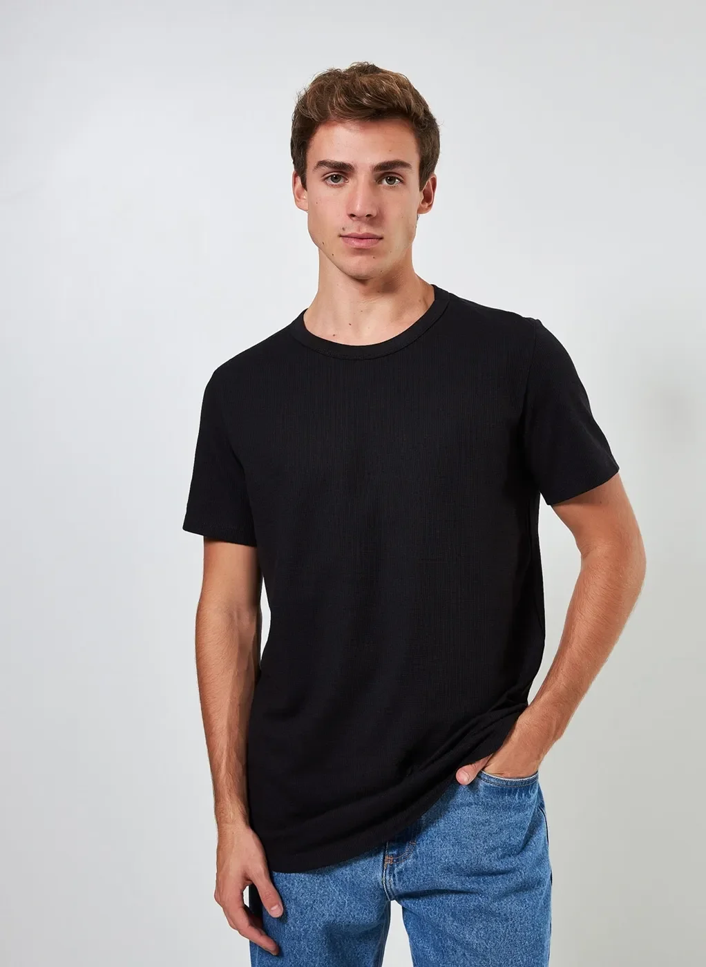 Camiseta Alongada em Malha Texturizada