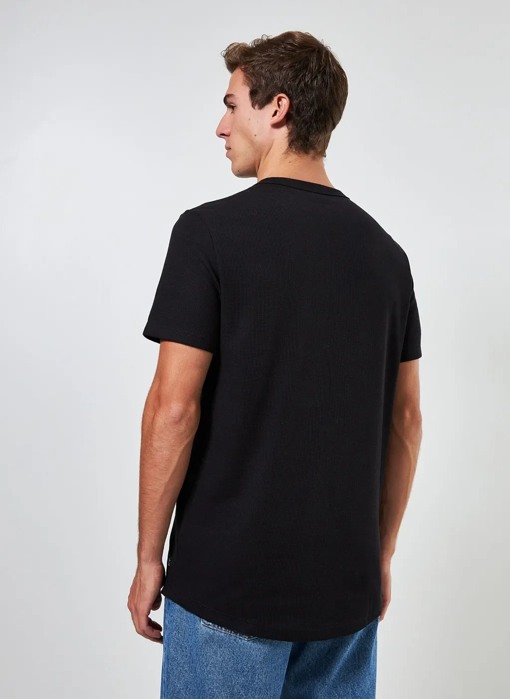 Camiseta Alongada em Malha Texturizada