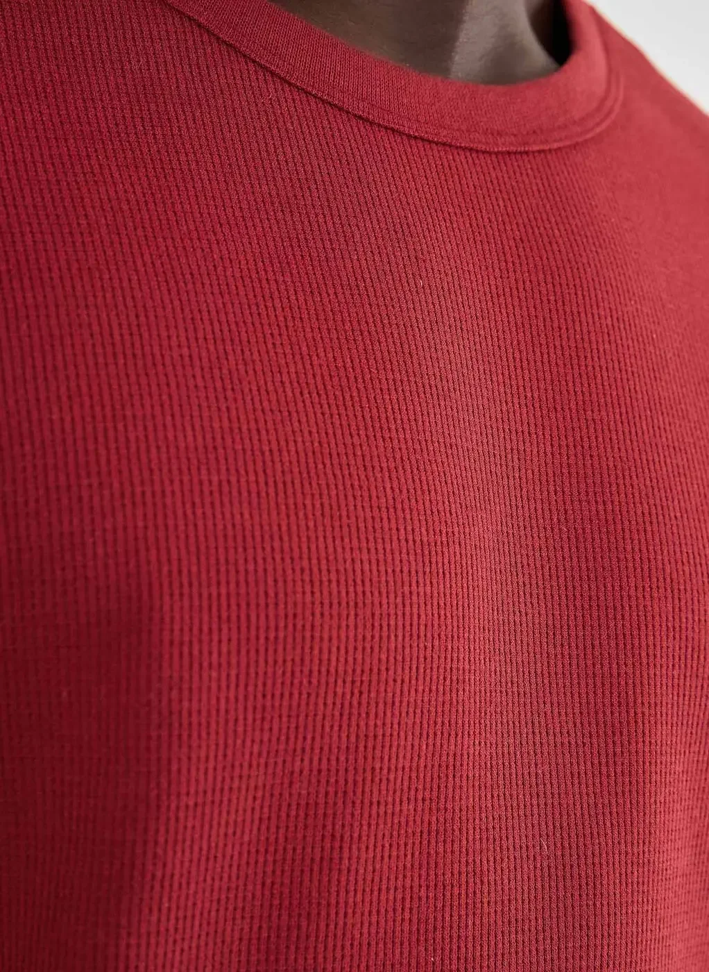 Camiseta Alongada em Malha Texturizada