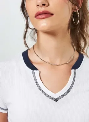 Blusa Cropped Off-White Com Marinho