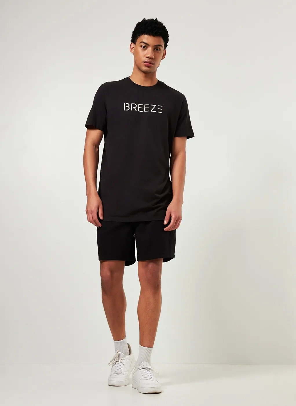 Camiseta Alongada Preta Escrito Breeze