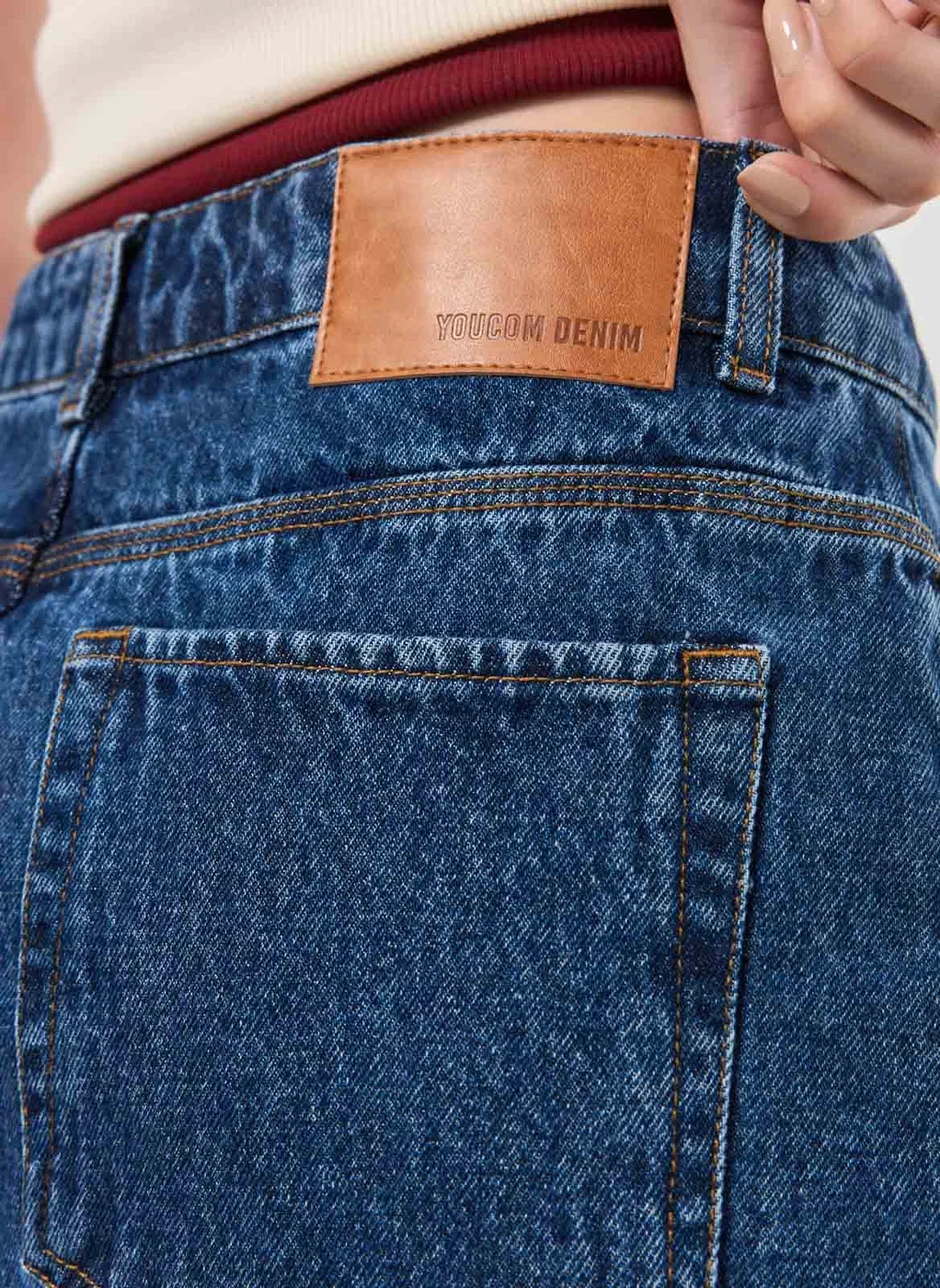 Saia Jeans Barra Desfiada Cintura Média