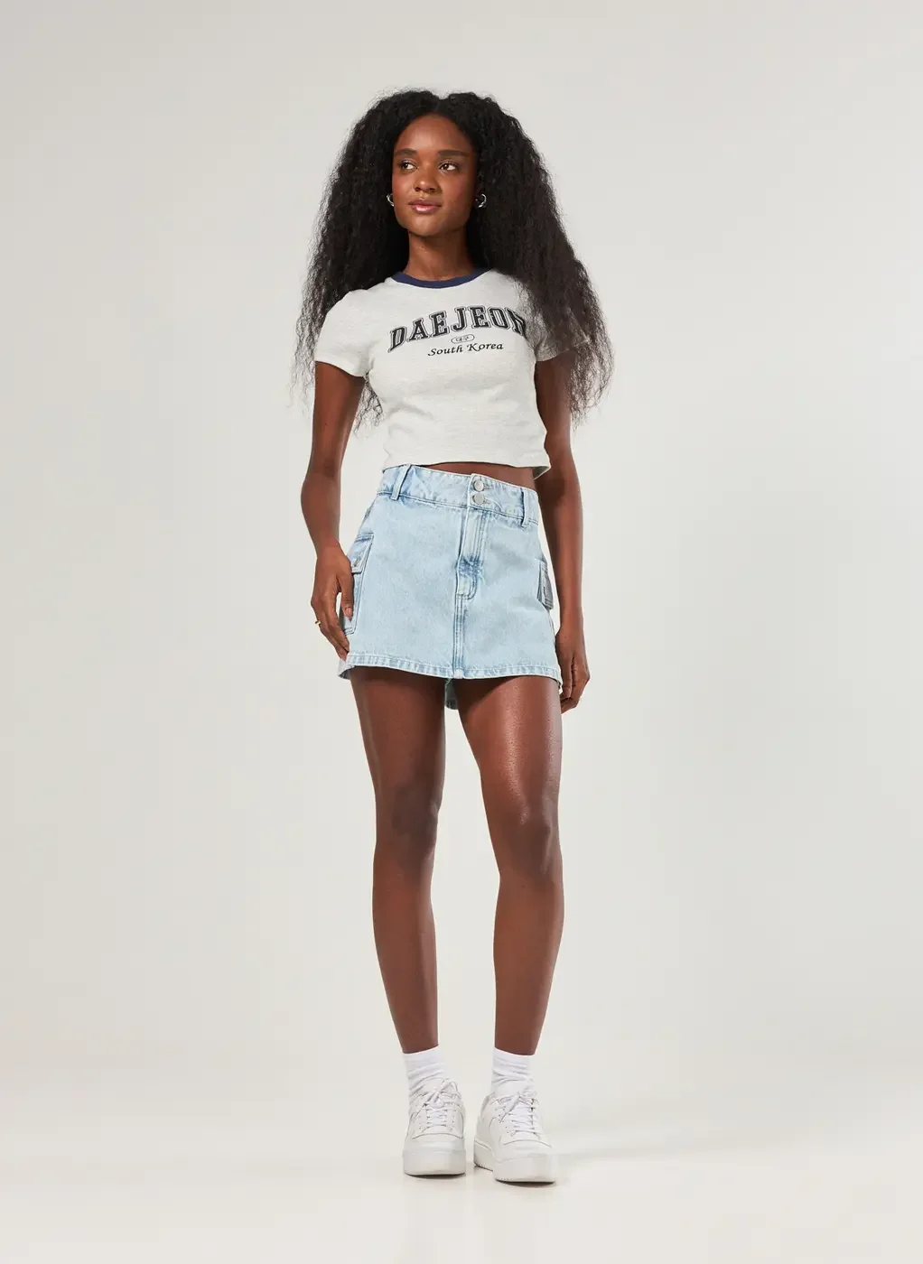 Short Saia Jeans Cargo Cintura Alta