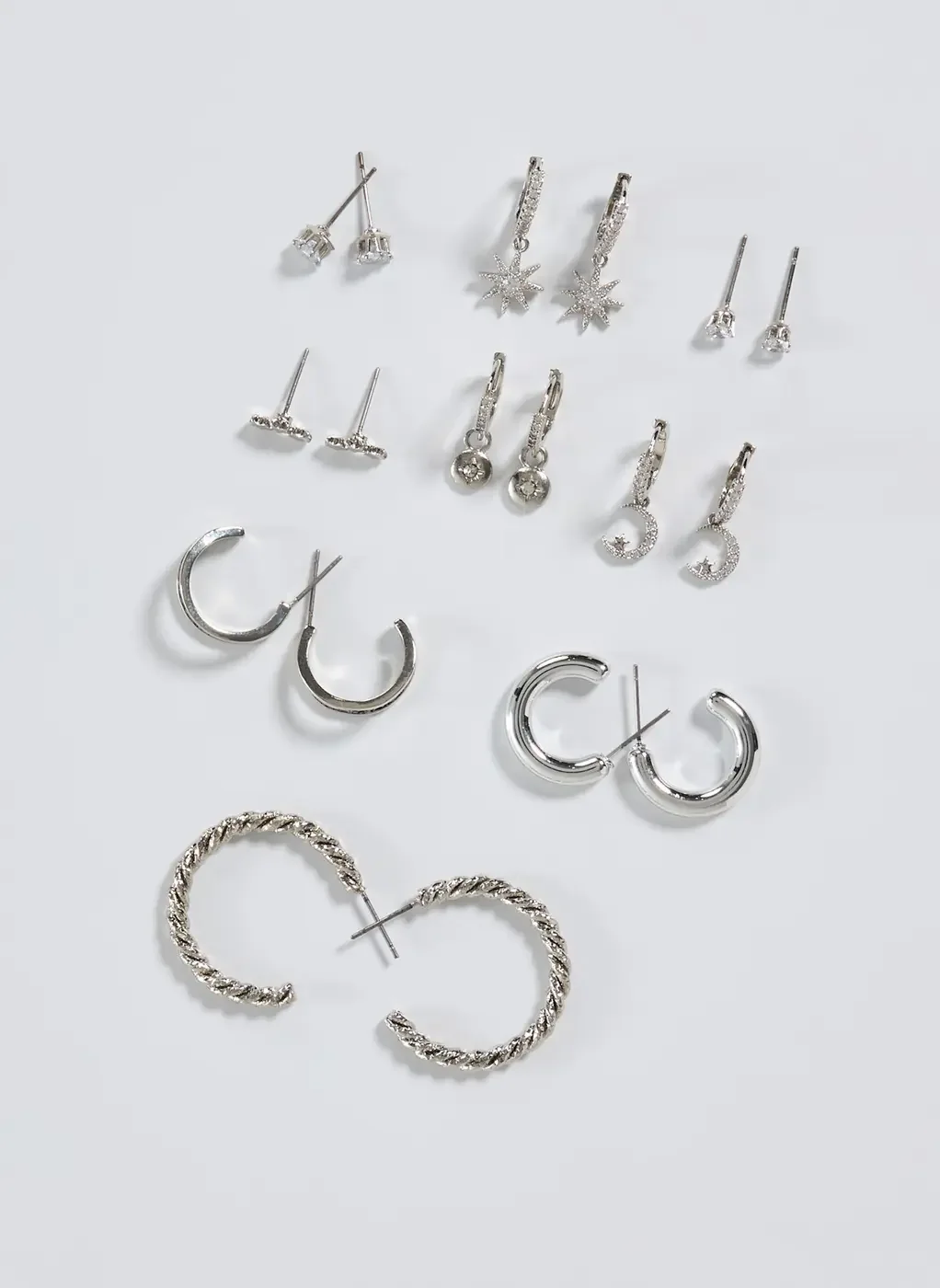 Conjunto 9 Brincos Prateados Zircônia