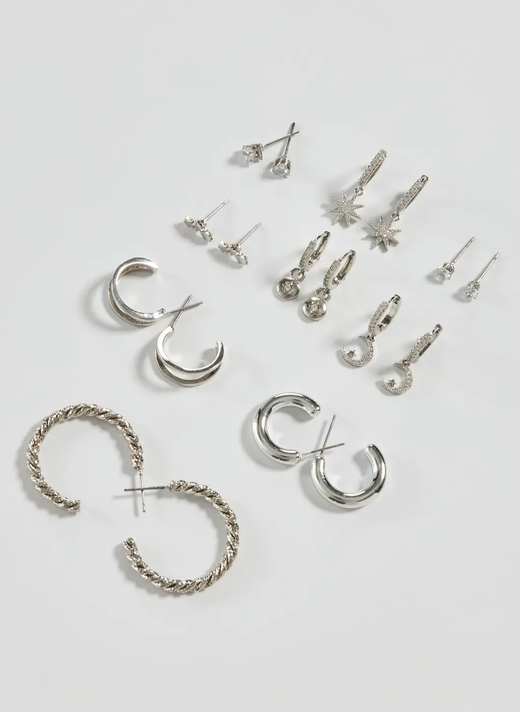 Conjunto 9 Brincos Prateados Zircônia