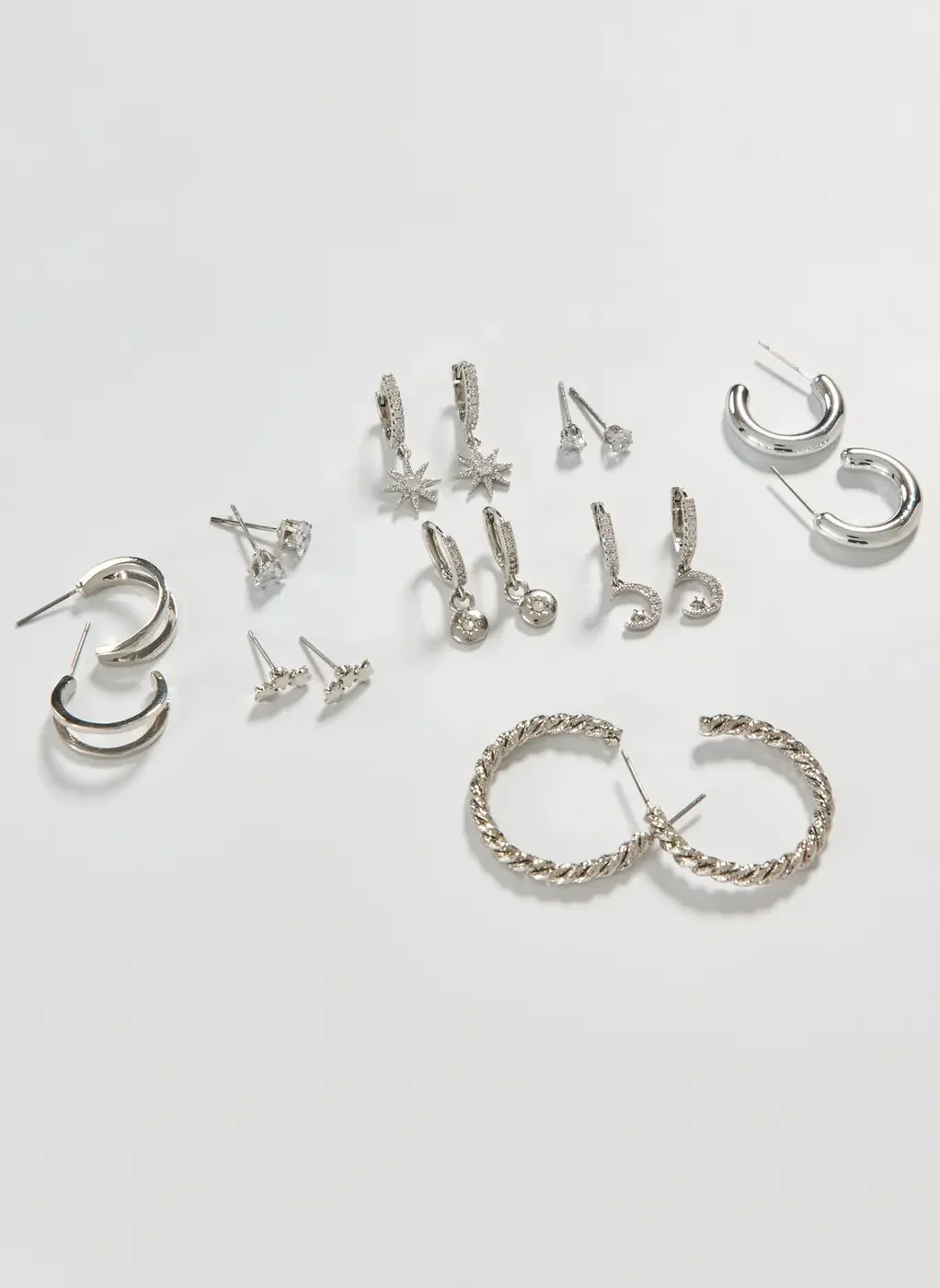 Conjunto 9 Brincos Prateados Zircônia