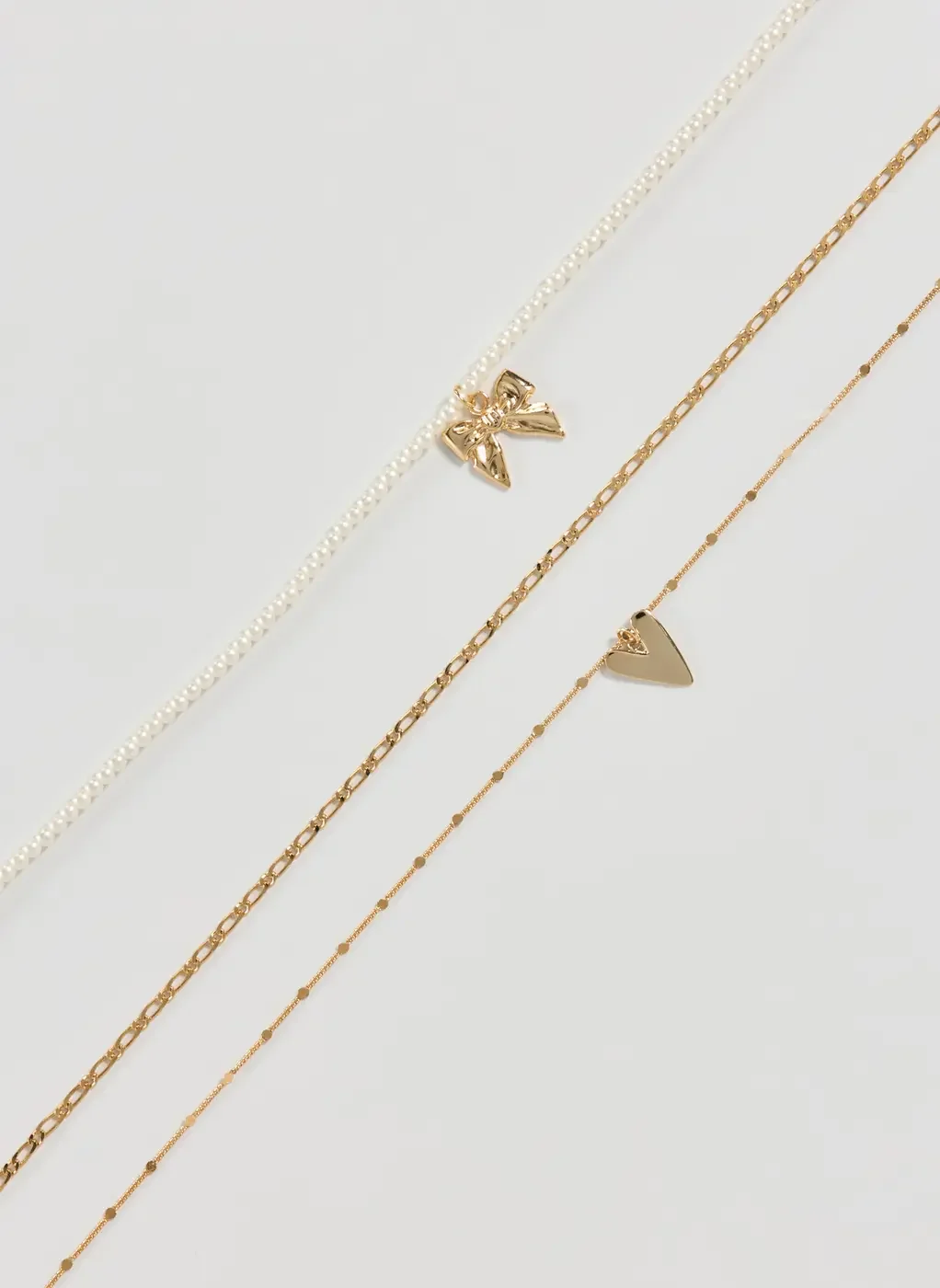 Conjunto Com 3 Colares Dourados Laço