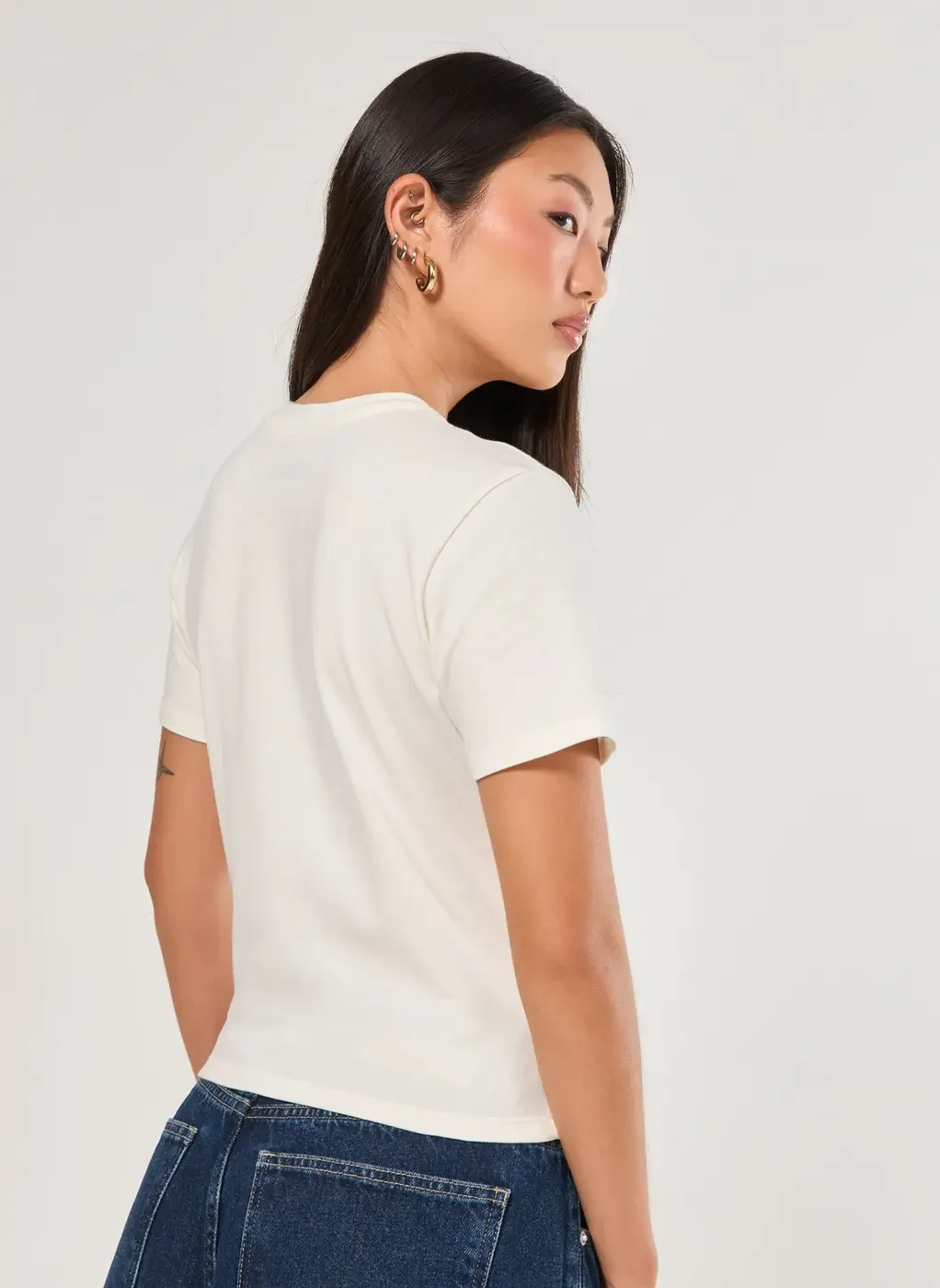 Camiseta Off-White Tokyo Varsity