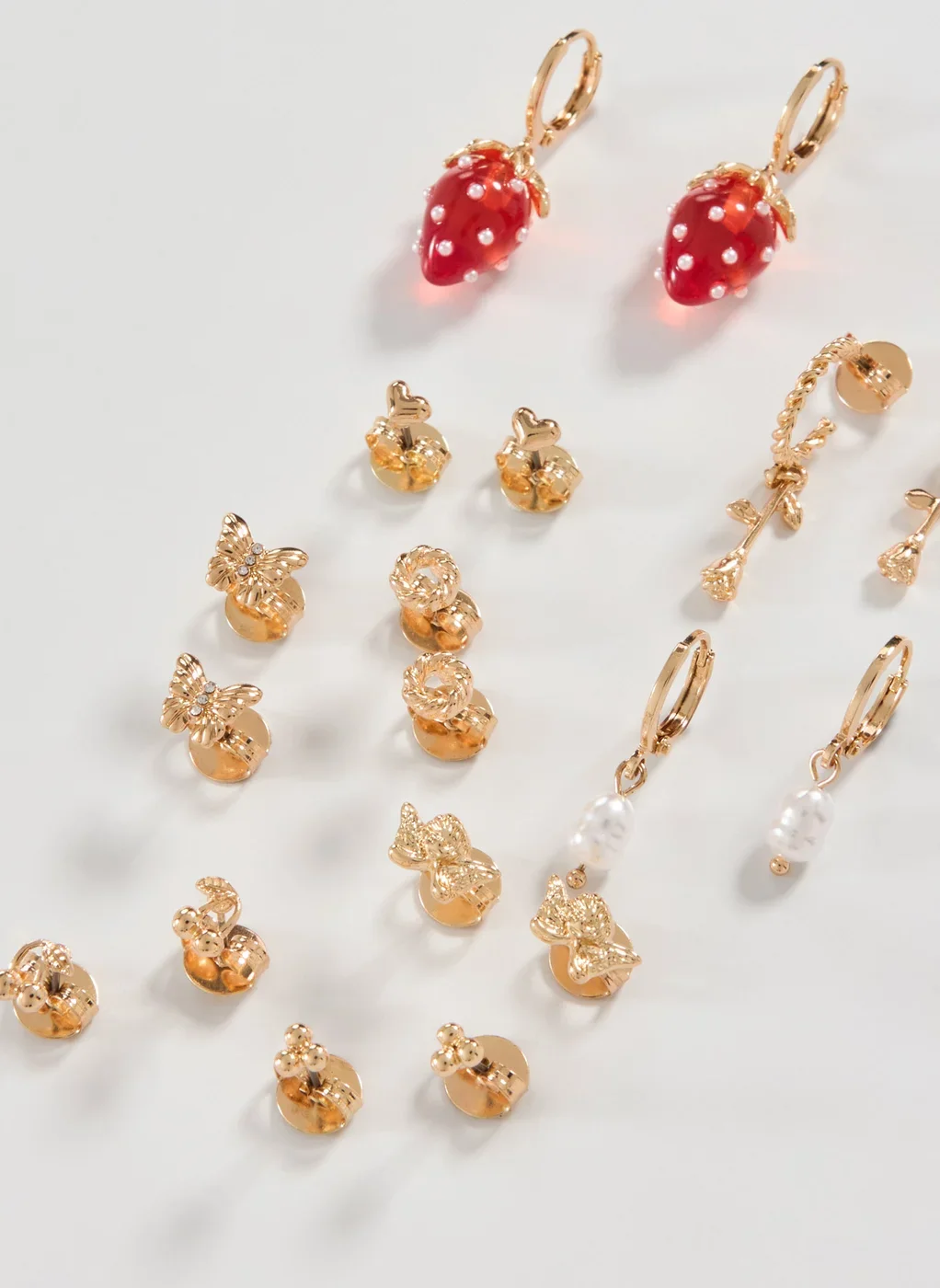 Conjunto 9 Brincos Dourados Morango