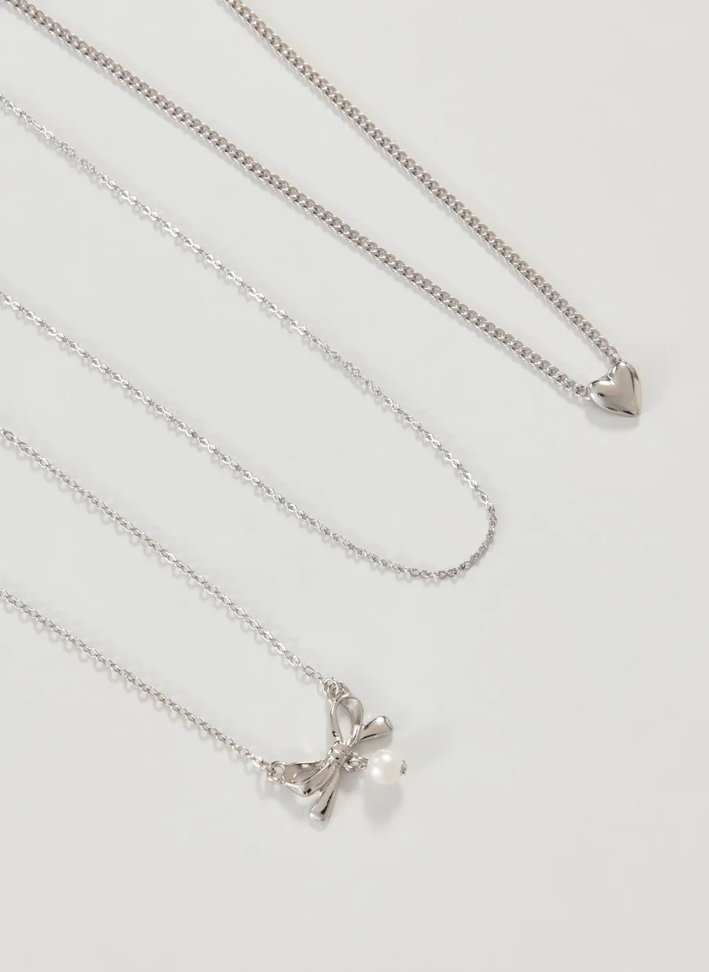 Conjunto 3 Colares Prateados Laço Pérola